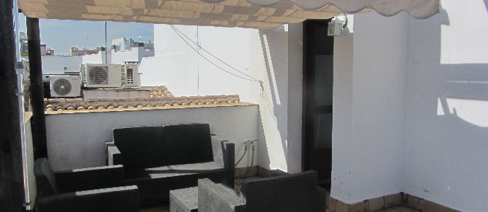 salon en vivienda turistica en Triana Sevilla